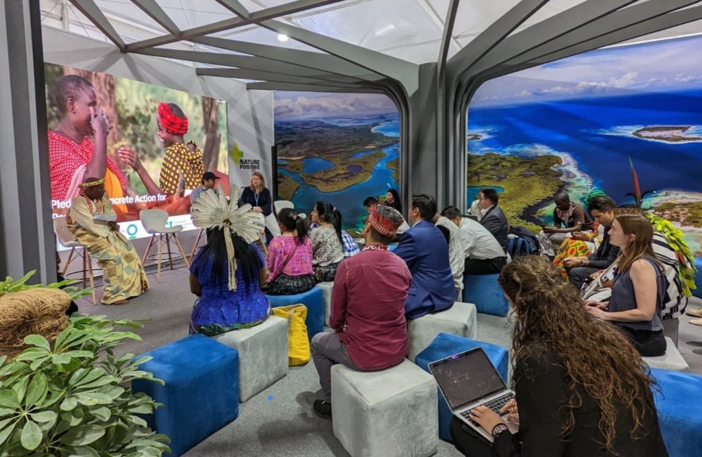 A picture of conference taken from back of the room.