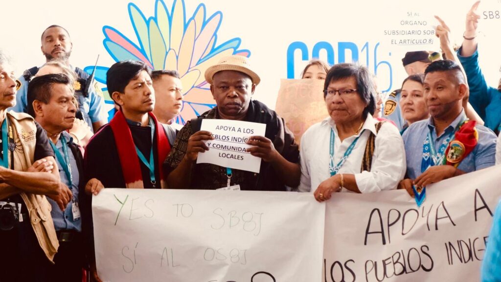 Group of people holding banners